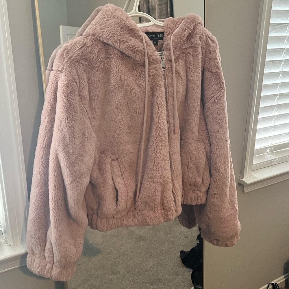 Zip up jacket.